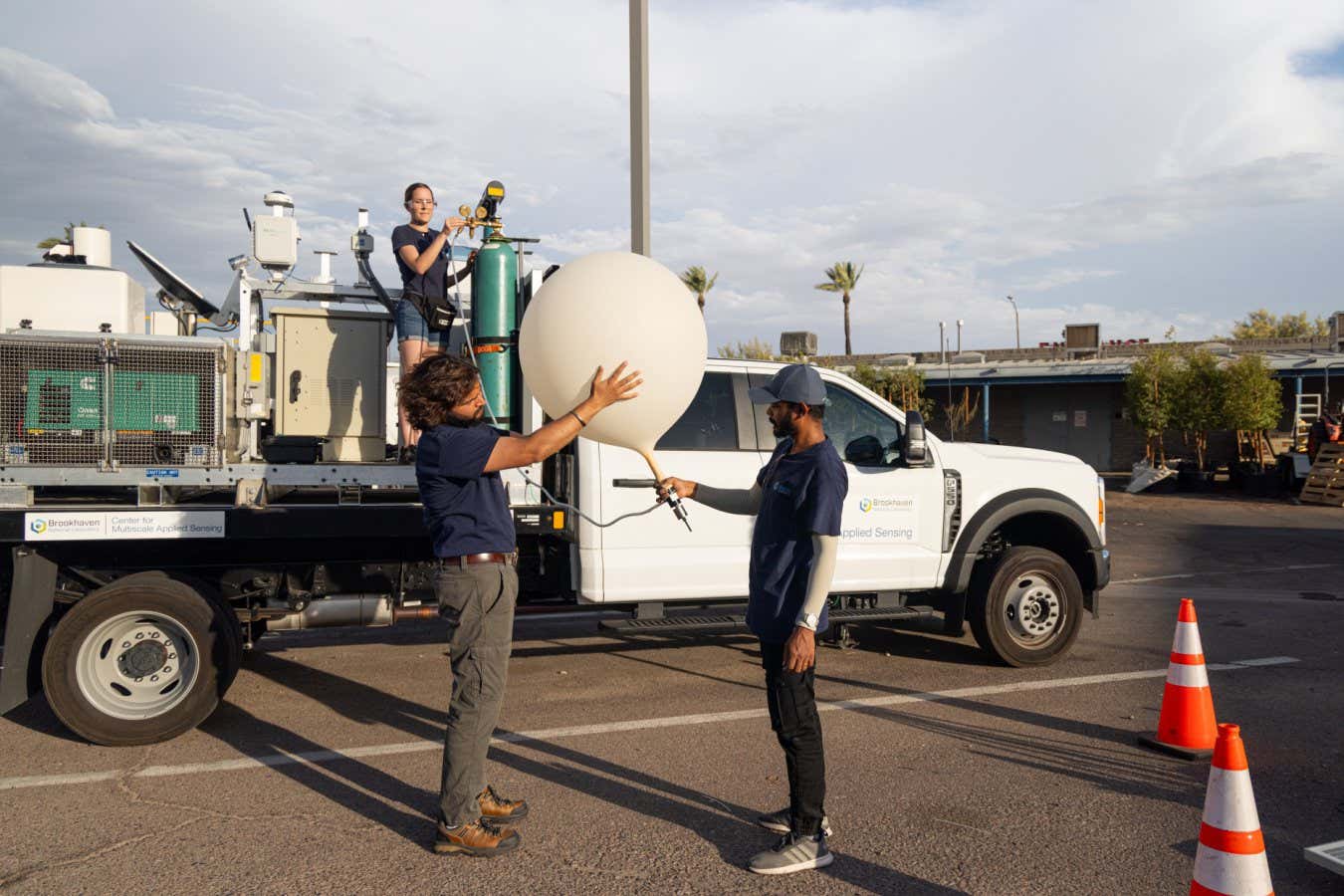 Truck outfitted with weather sensors, lasers and balloons