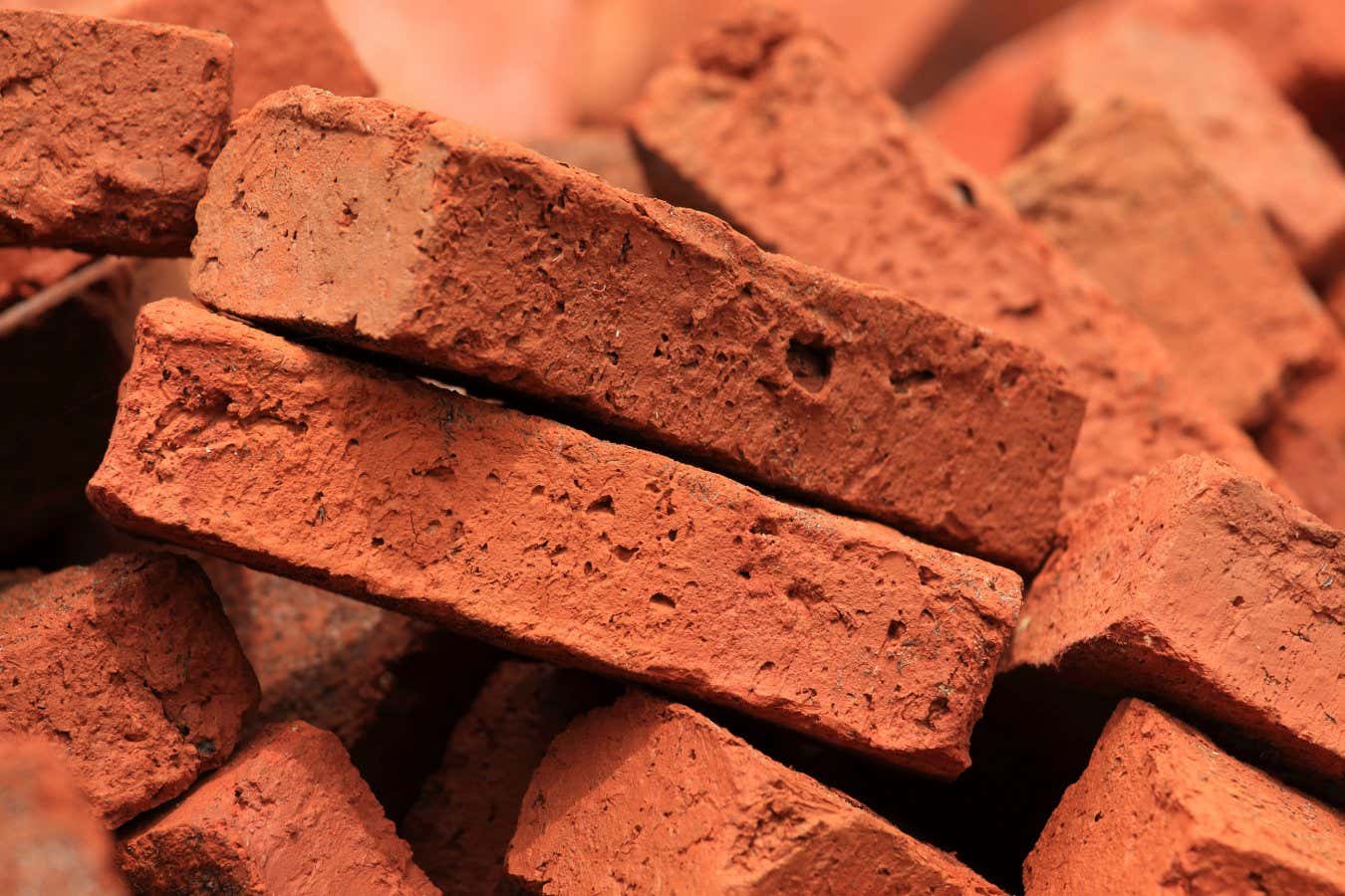 Closeup of Stack of Raw Bricks.; Shutterstock ID 151906697; purchase_order: -; job: -; client: -; other: -