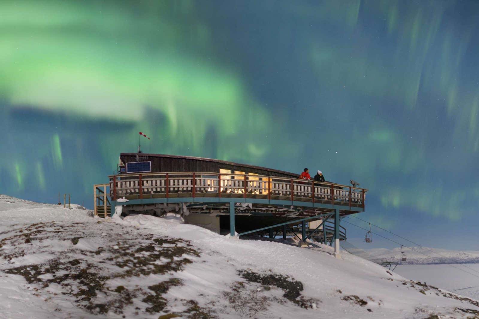 Abisko aurora sky station with Northern lights above, Abisko National Park, Sweden